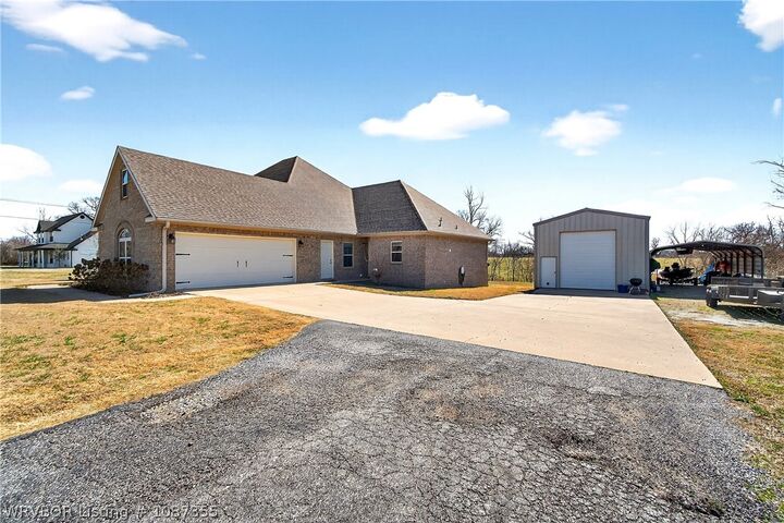 Property Photo:  1701 Elm Springs Road  AR 72762 