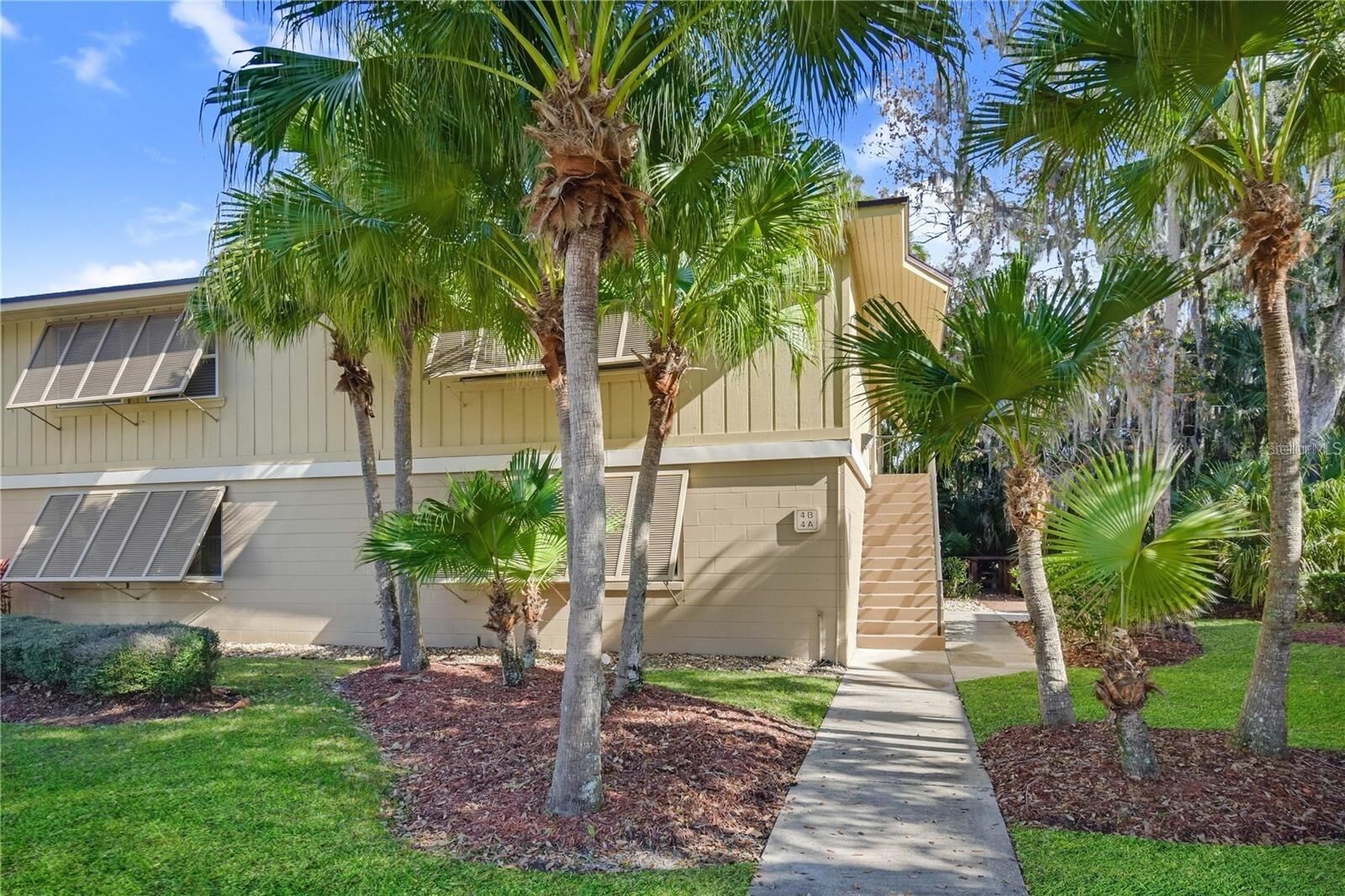 Property Photo:  120 Hibiscus Woods Court 4B  FL 32725 