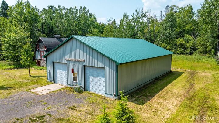 Property Photo:  25649 Portage Entry Road  MI 49916 