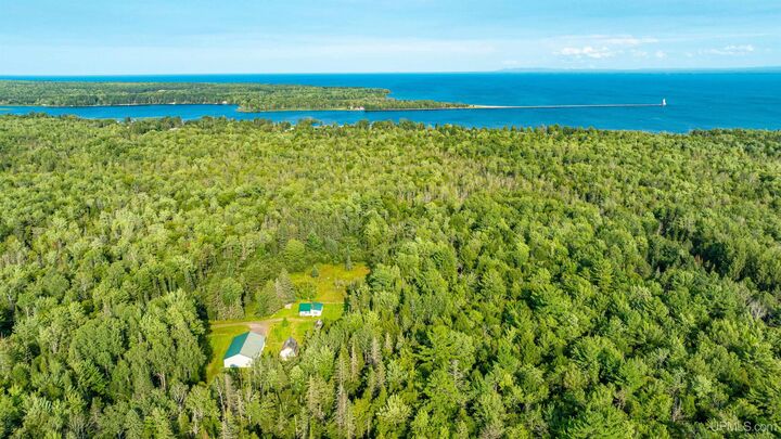 Property Photo:  25649 Portage Entry Road  MI 49916 