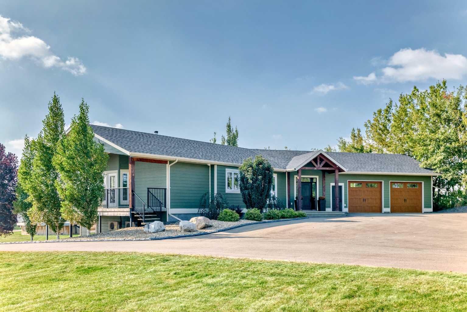 Property Photo: 254041 Township Road 435 AB T4J 1R2