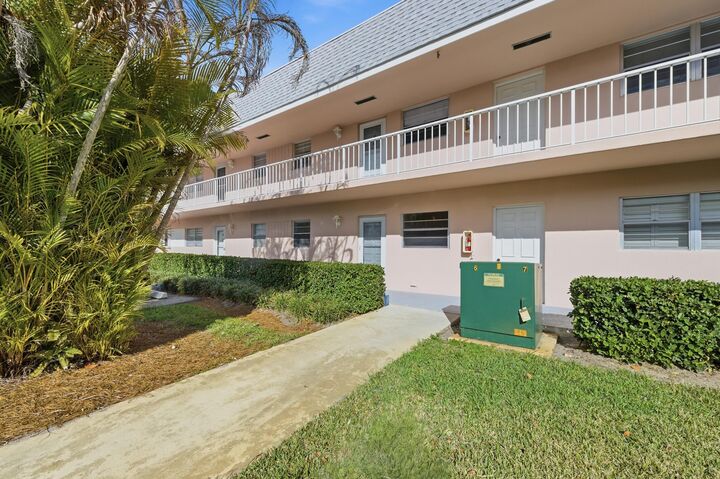 Property Photo:  18081 SE Country Club Drive 3-23  FL 33469 