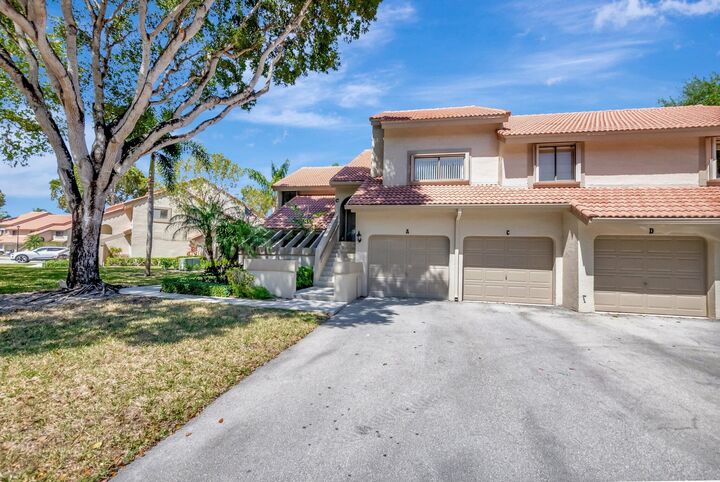 Property Photo:  5731 Coach House Circle A  FL 33486 