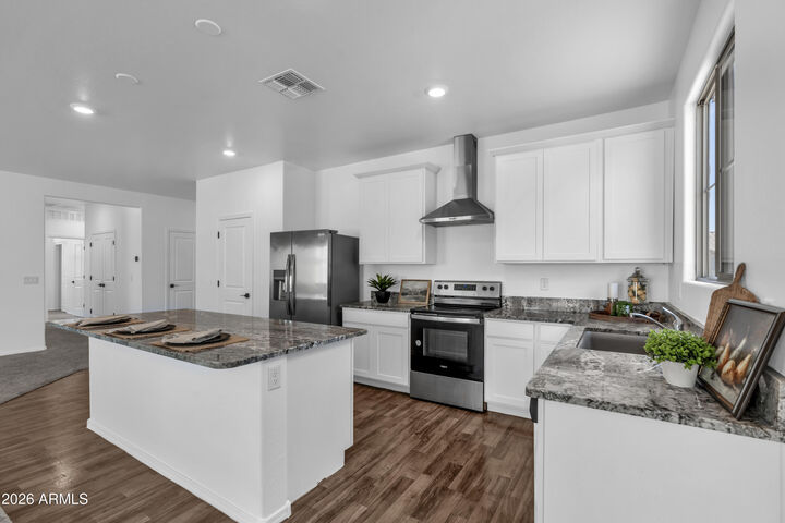 Property Photo: 11442 W La Reata Avenue AZ 85392