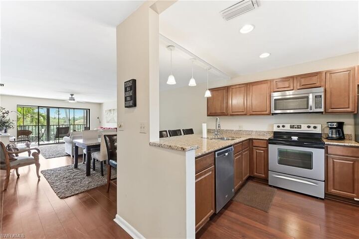 Property Photo:  5725 Gage Ln E301  FL 34113 