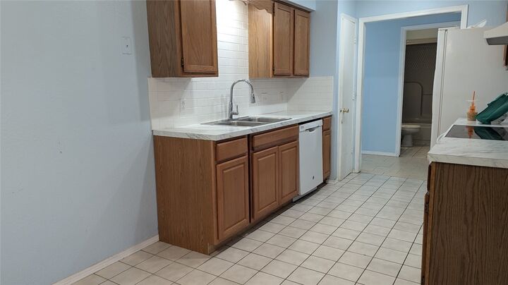 Property Photo:  1909 & 1911 S F Street  AR 72758 