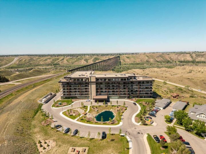 Property Photo: 102 Scenic Drive N 218 AB T1J 0J4