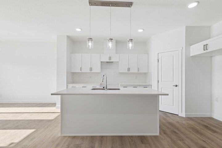 Property Photo: 134 Heartland Street AB T4C 3L9