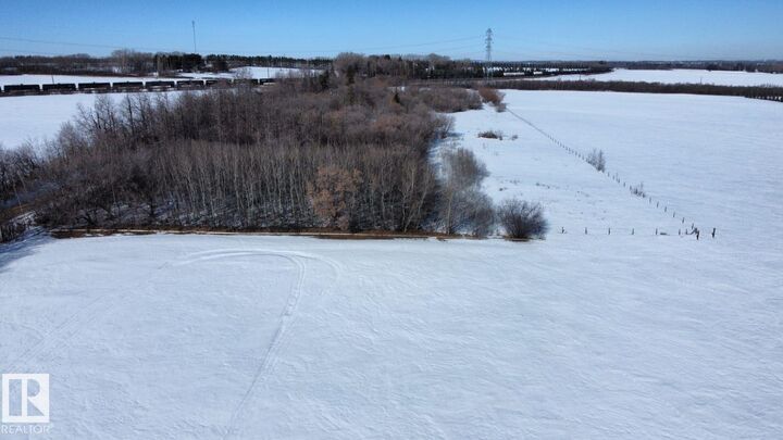 Property Photo:  19125 25 Street NE  AB T5Y 6K2 