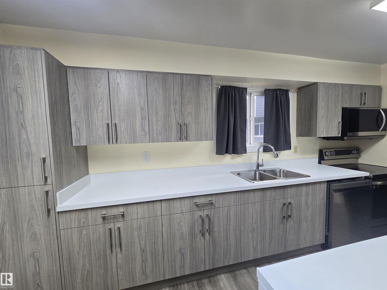 Property Photo: 4403 Riverbend Road NW 2 AB T6H 5S9