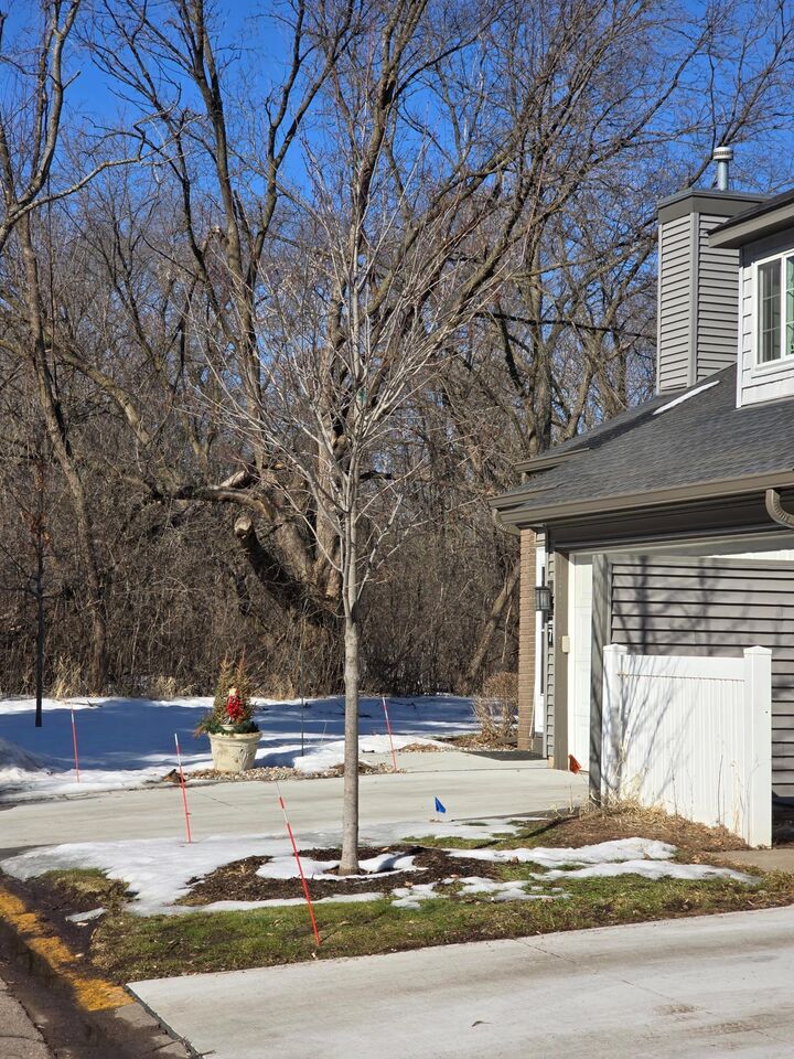 Property Photo:  9935 Russell Avenue N 7  MN 55444 