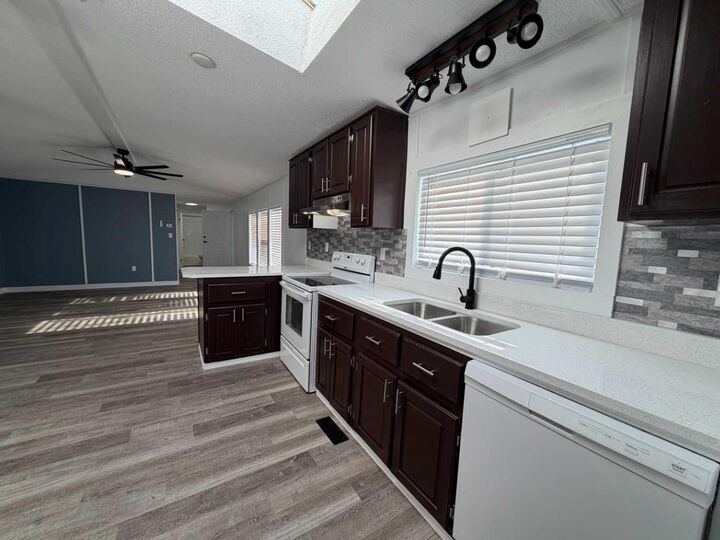 Property Photo:  812 6 Avenue SW 92  AB T0G 2A4 