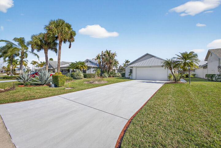 Property Photo:  7198 SE Quincy Terrace  FL 33455 