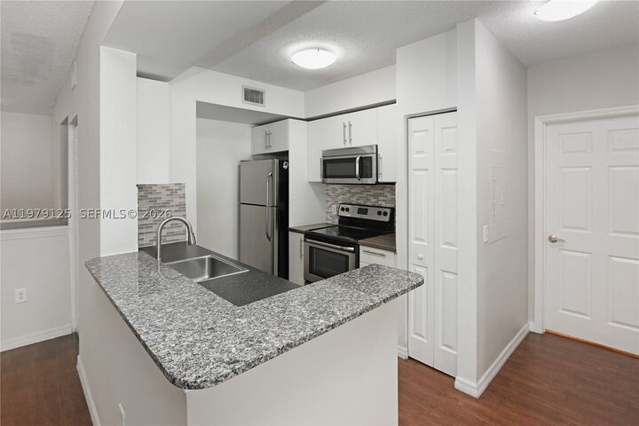 Property Photo: 2442 Centergate Dr 202 FL 33025