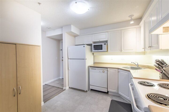 Property Photo:  13780 76 Avenue 308  BC V3W 1E5 