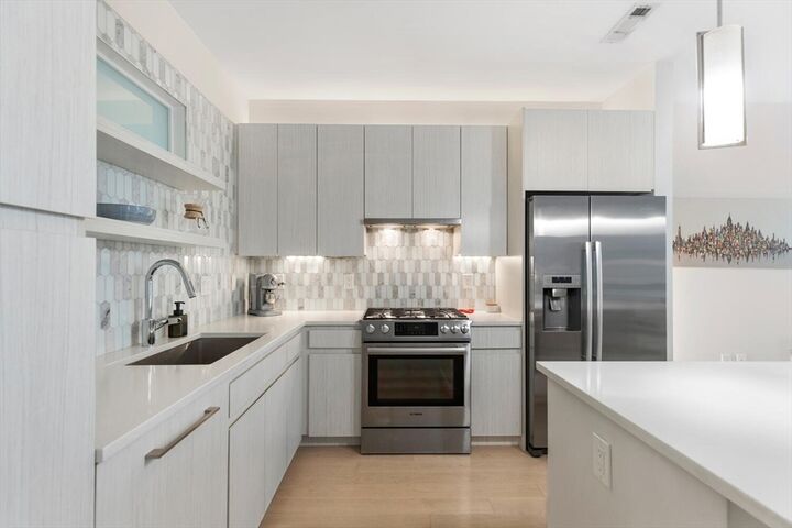 Property Photo:  45 W 3rd St 314  MA 02127 