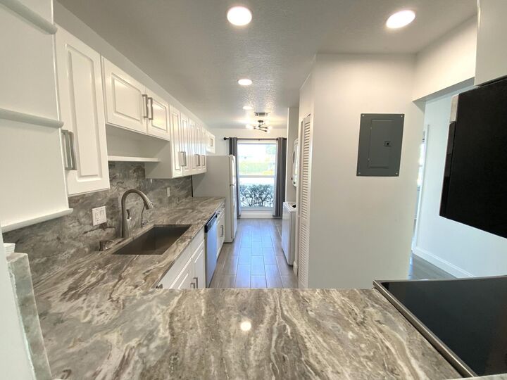 Property Photo:  2450 Black Olive A  FL 33445 