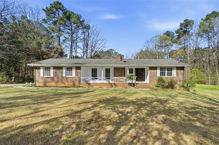 Property Photo:  2401 Ebenezer Road SE  GA 30094 