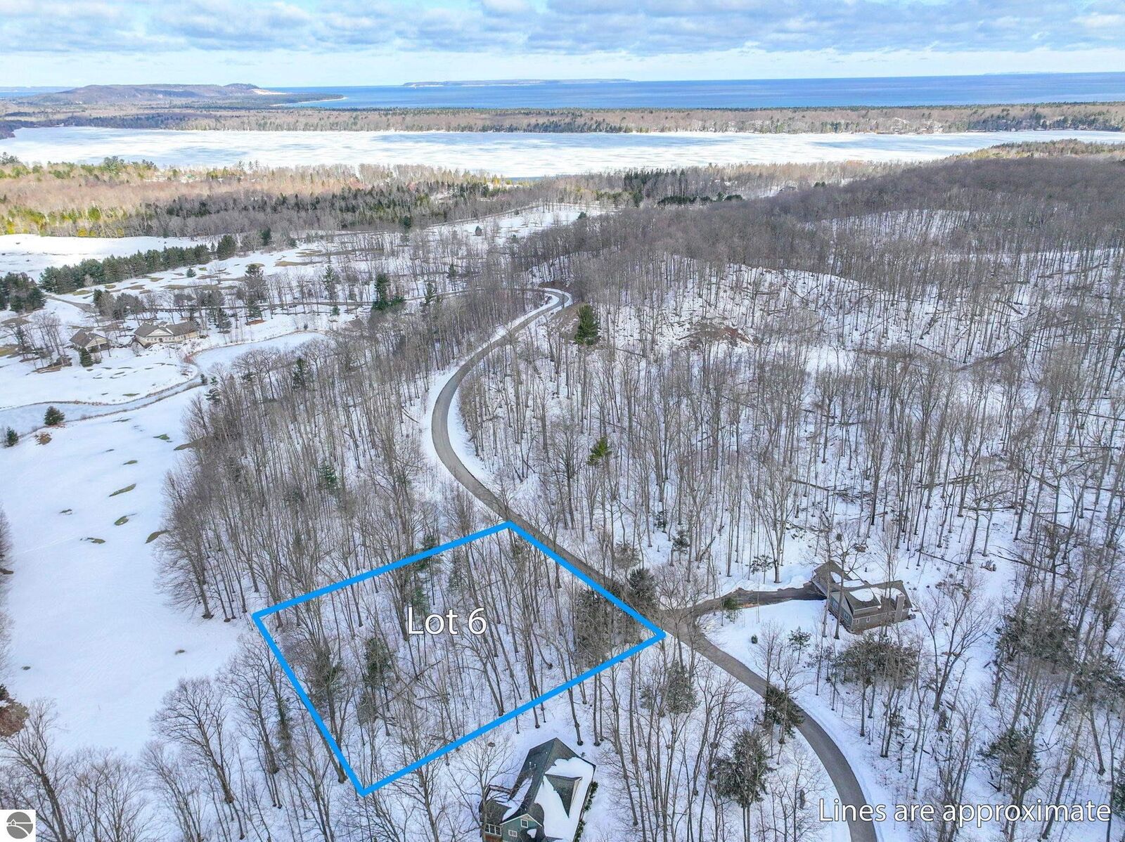 Property Photo:  Lot 6 S Club Drive  MI 49621 