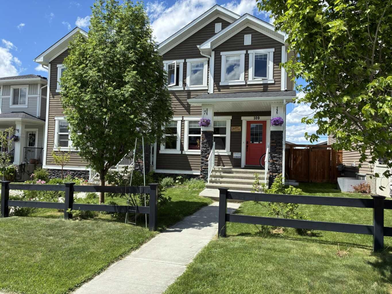 Property Photo: 109 Heartland Boulevard AB T4C 2R1