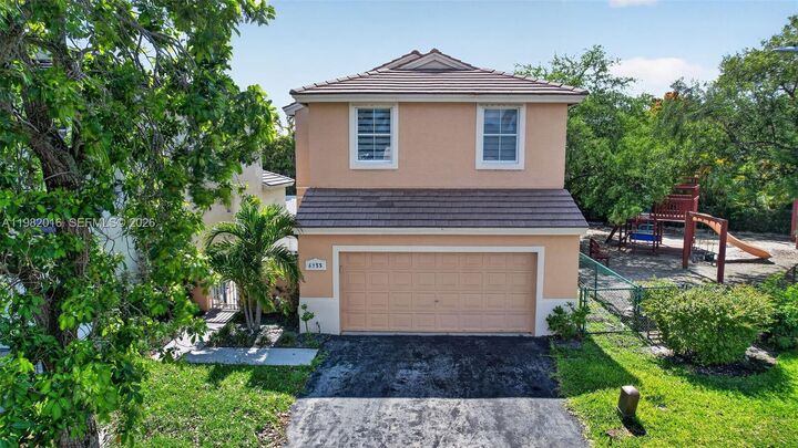 Property Photo:  6955 SW 148th Ln  FL 33331 