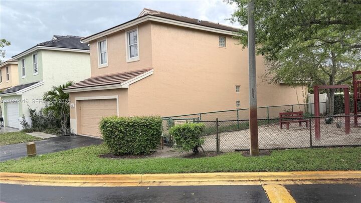 Property Photo:  6955 SW 148th Ln  FL 33331 