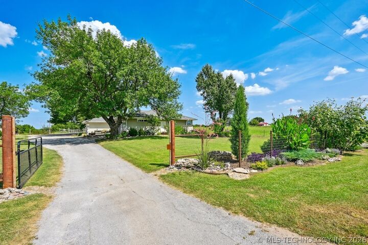 Property Photo:  14223 N Memorial Drive  OK 74021 