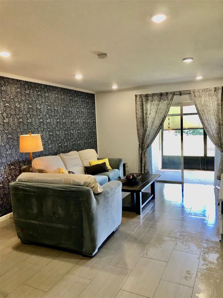 Property Photo:  102 Capri Isles Boulevard 106  FL 34292 