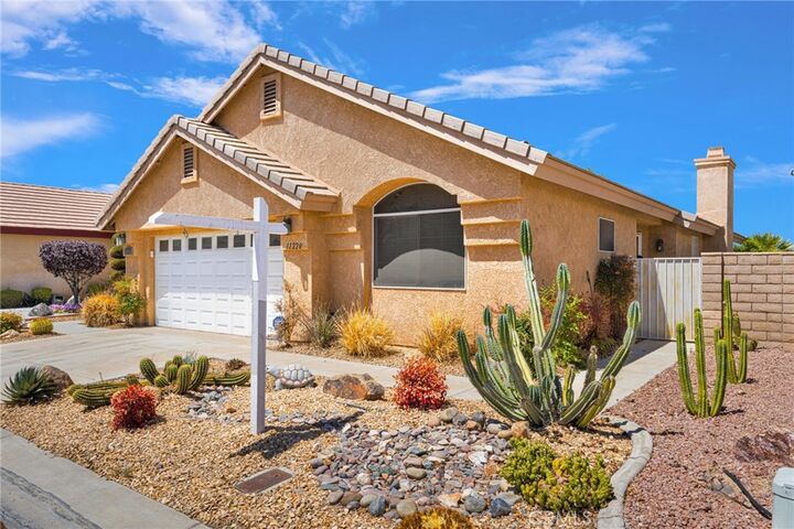 Property Photo:  11220 Country Club Drive  CA 92308 