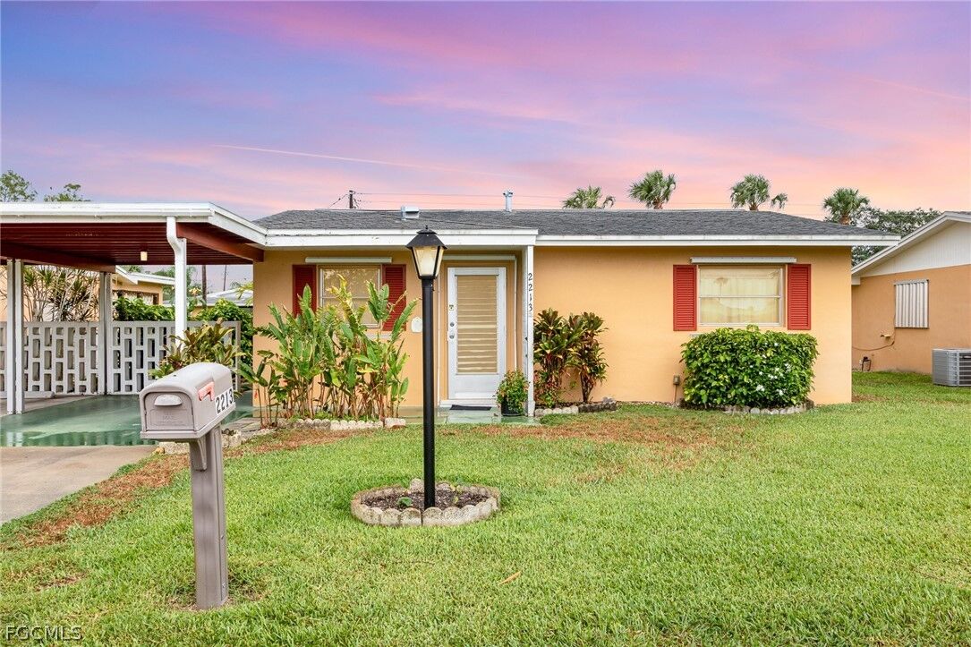 Property Photo: 2213 Orchid Road FL 33936