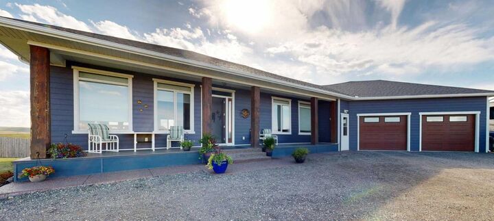 Property Photo: 295043 722 Avenue E AB T0L 1R0
