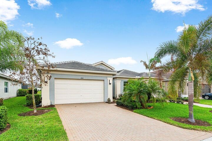 Property Photo:  11963 SW Water Lily Terrace  FL 34987 