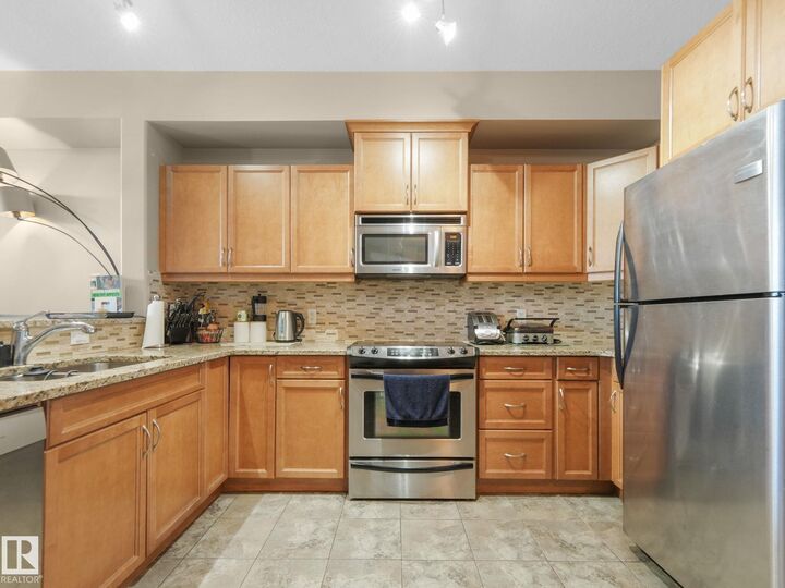 Property Photo: 12408 15 Avenue SW 412 AB T6W 1X2