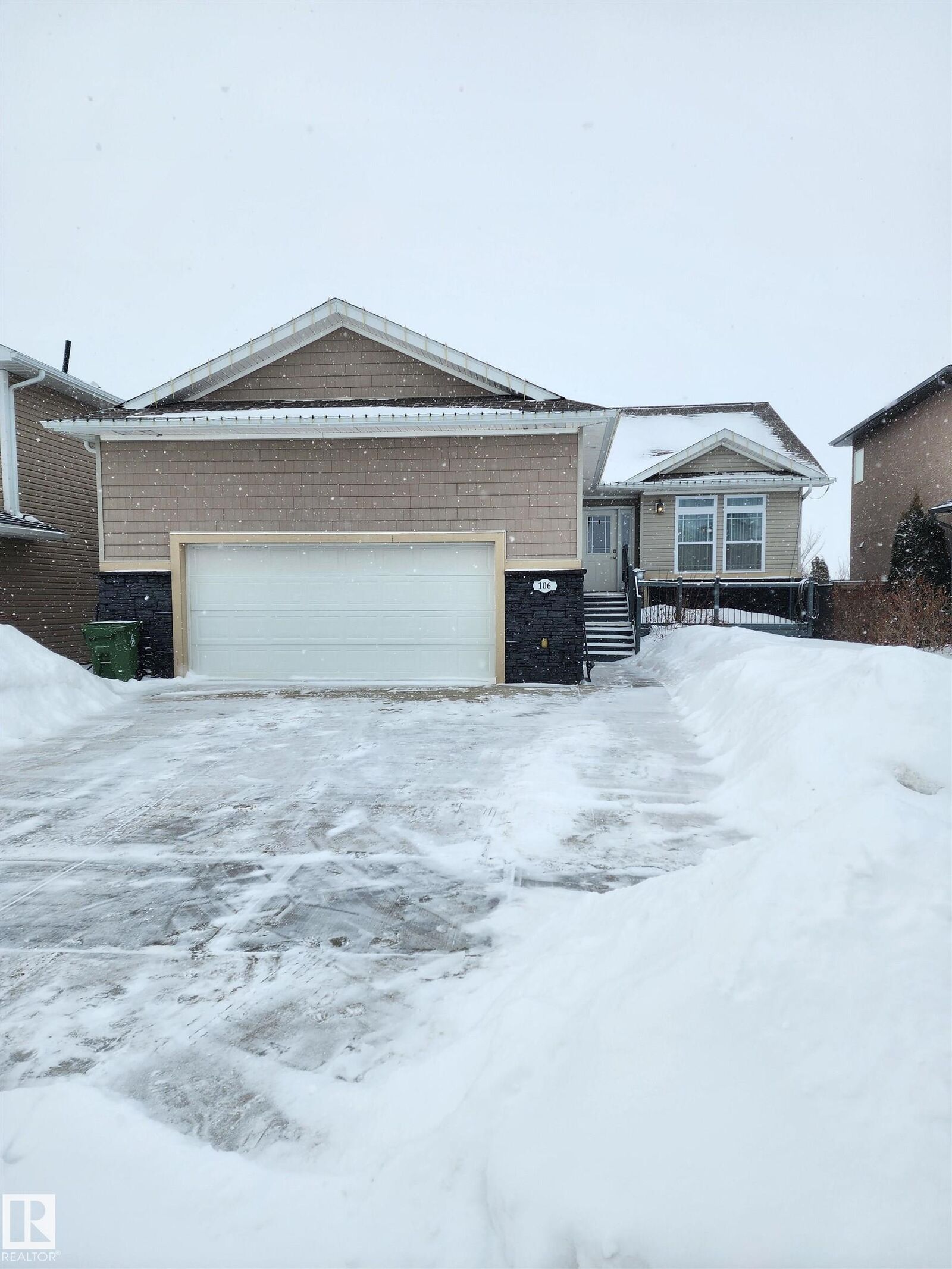 Property Photo: 106 Houle Drive AB T8R 0E1