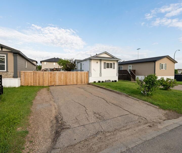 Property Photo: 284 Caouette Crescent AB T9K 2H9