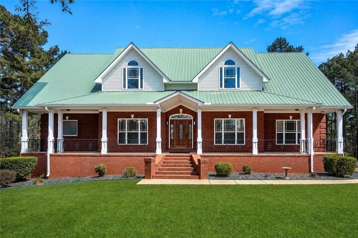 Property Photo:  4860 Peeksville Road  GA 30252 