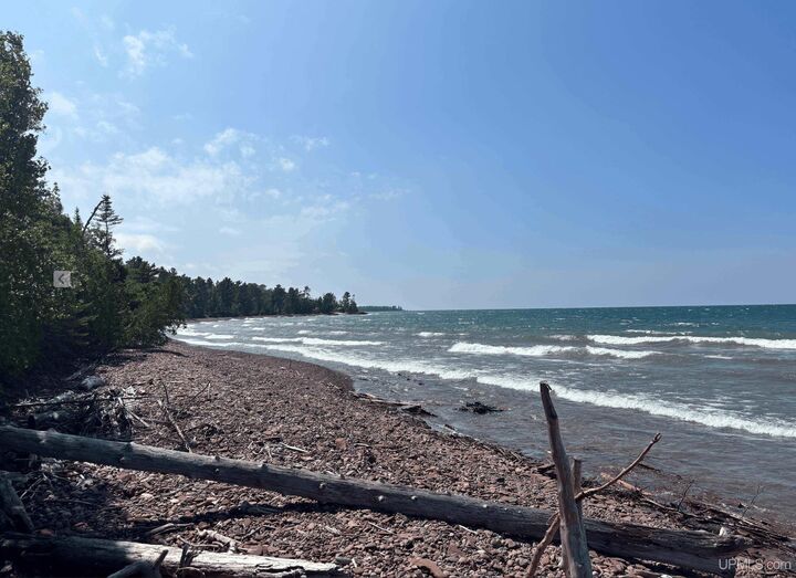 Property Photo:  2741 Sunset Bay Beach Road  MI 49805 