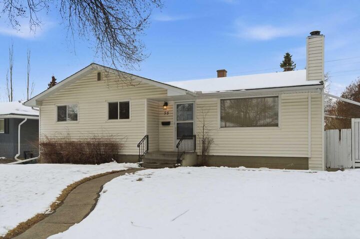 Property Photo:  58 Westwood Drive SW  AB T3C 2V7 