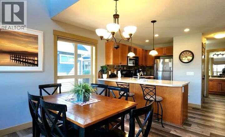 Property Photo: 6844 Madrid Way 321 BC V1Z 3R8