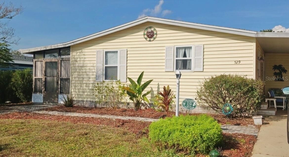 Property Photo:  529 Rainbow Boulevard  FL 32159 