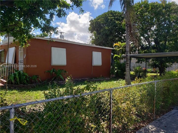 Property Photo:  11970 NW 10th Ave  FL 33168 