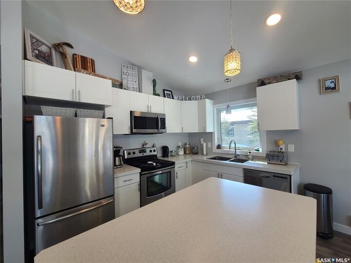 Property Photo:  1327 Kewatin Lane  SK S0M 1J0 