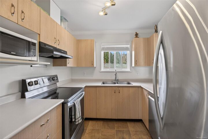 Property Photo:  840 Braidwood Rd #401  BC V9N 3R9 
