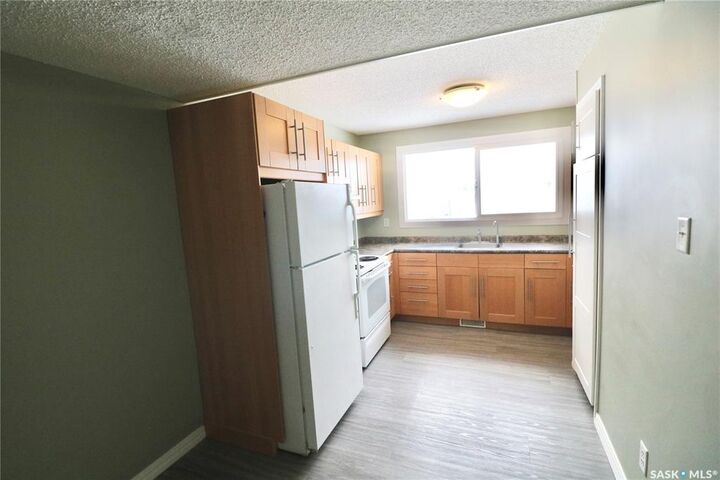 Property Photo: 35 Mackenzie Way SK S4N 5M5