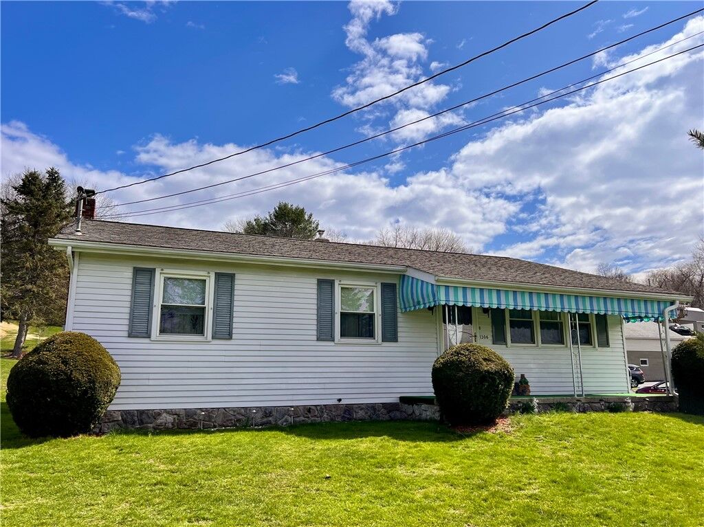 Property Photo:  1306 Locust Ave  PA 15673 