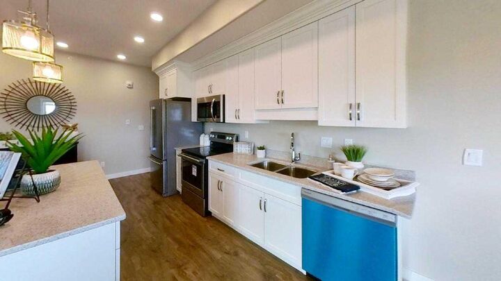 Property Photo: 499B Meadow Lake Court E 201 AB T1R 0Y7