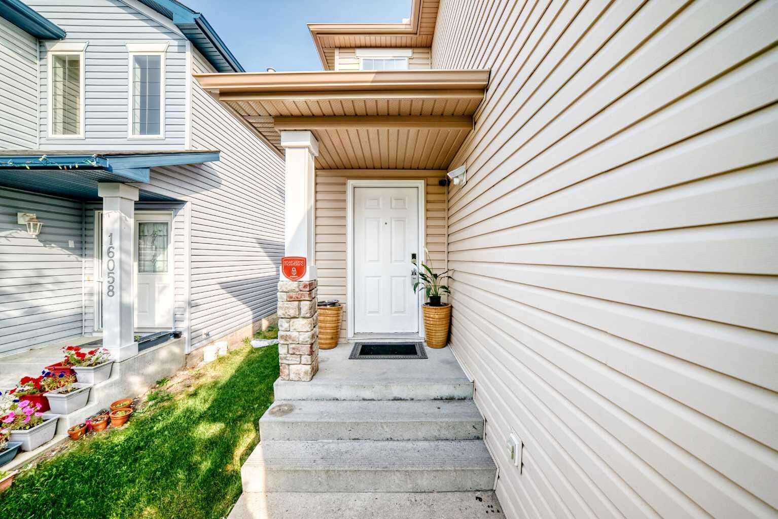 Property Photo: 16062 Everstone Road SW AB T2Y 4J7