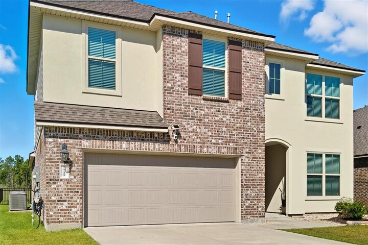 Property Photo:  1725 Sawgrass Drive  LA 70669 