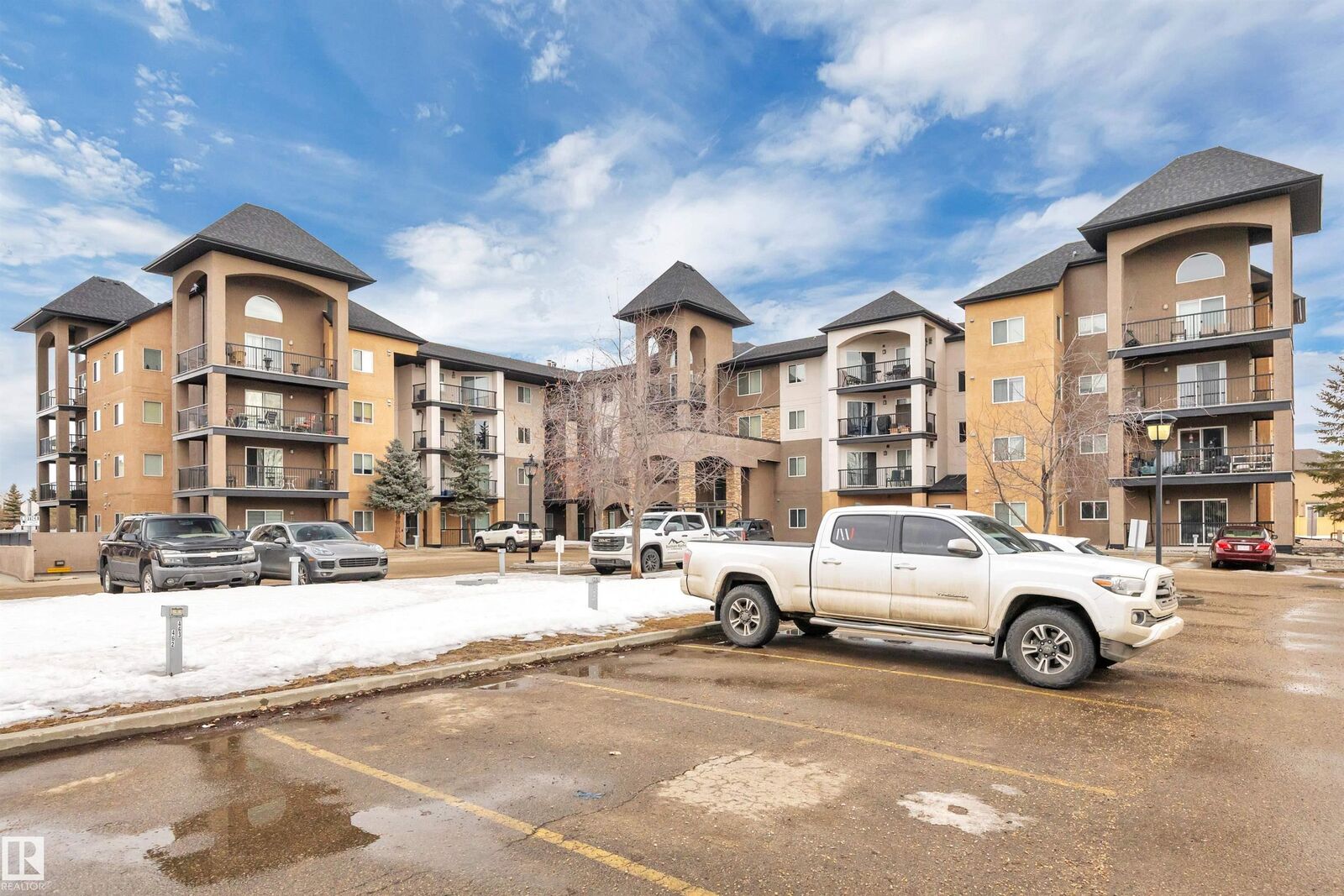 Property Photo:  14612 125 Street NW 313  AB T5X 0B6 