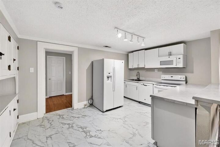 Property Photo: 5103 Waterman Boulevard MO 63108